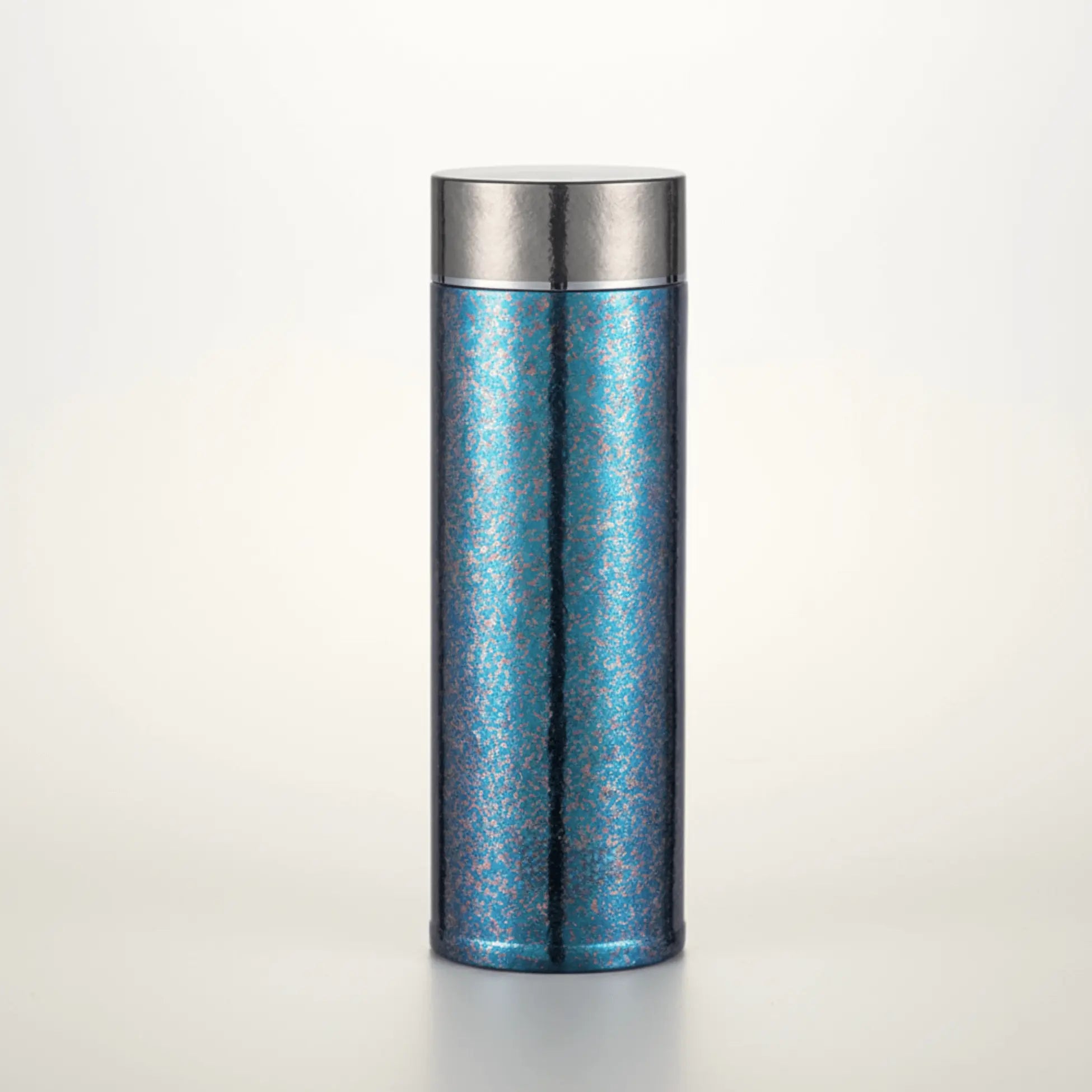 Aigrezzo titanium insulated  water bottle with blue ice-crystal anodized finish, sleek lightweight design on a clean background