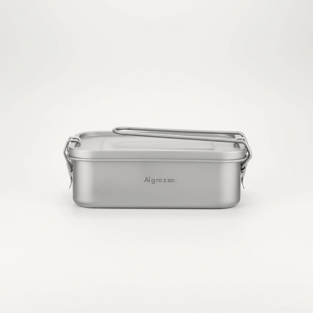 Aigrezzo titanium portable outdoor lunch box with secure locking clips and minimalist matte finish on a clean white background